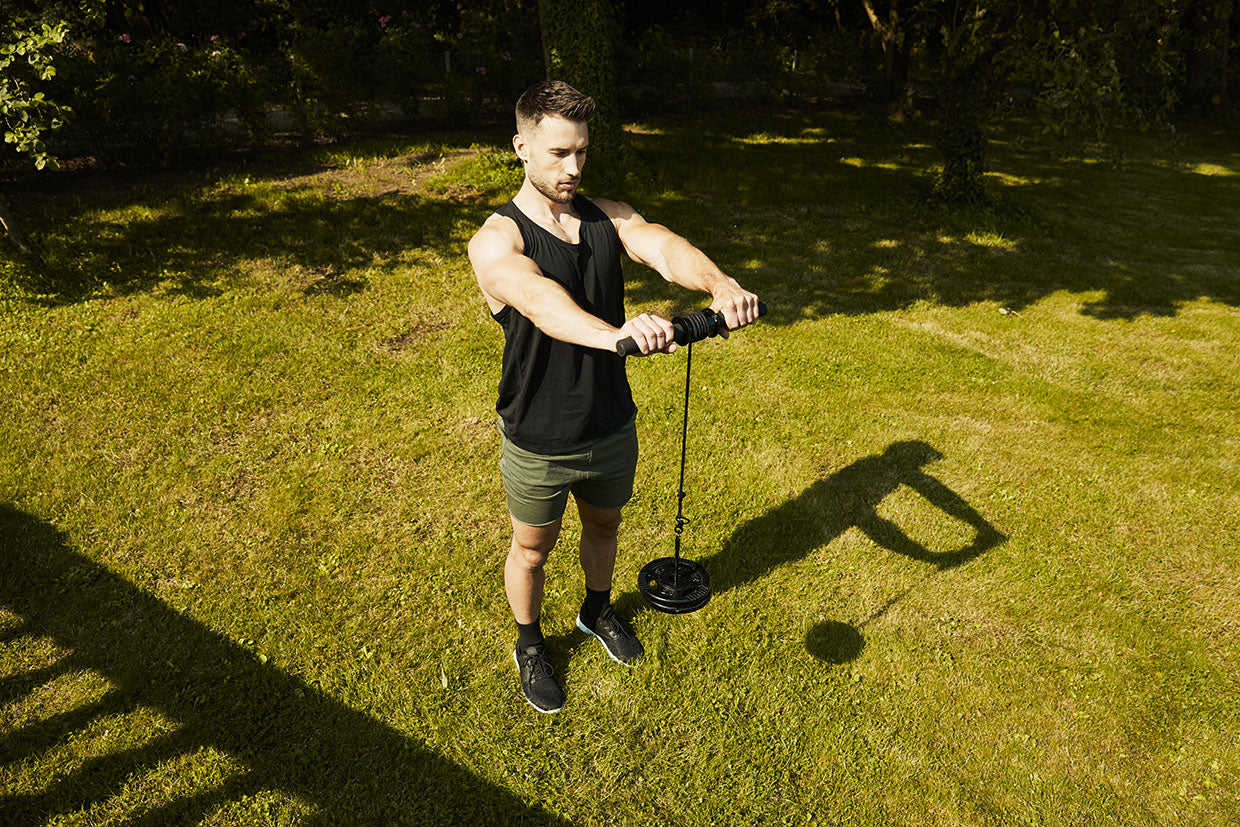 Riešo treniruoklis su svorių diskų pasipriešinimu, max 18 kg